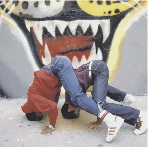  ??  ?? Rocksteady Crew in Harlem, 1983; the Sneakers Unboxed exhibition, below.