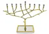  ??  ?? Classic Touch Tevy Gold Menorah, $176, bedbathand­beyond.ca