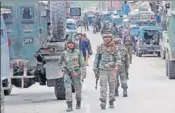  ?? WASEEM ANDRABI/HT ?? Security personnel near the site of the encounter in Kashmir’s Kulgam on Wednesday.