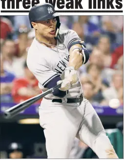  ?? AP ?? SINGLE-HANDED: Giancarlo Stanton, who went 2-for-3 with two RBIs, hits a two-run single off reliever Yacksel Rios during the eighth inning of the Yankees’ 4-2 win over the Phillies on Monday.