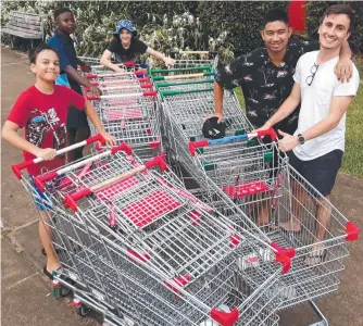  ?? ?? Zorion Smith, Simon Sibomana, Ben Hollis, Puran Rana and Arman Mohajer collected trolleys from around their area.