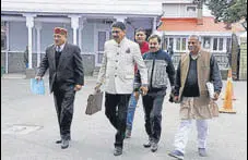  ?? DEEPAK SANSTA/HT ?? BJP MLAS Narender Thakur, Rakesh Pathania and Sukh Ram Chaudhary outside the Vidhan Sabha in Shimla on Friday.