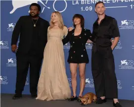  ?? CourTeSy of la biennale de Venezia ?? REUNITING: Craig Robinson, Kate Hudson, director Ana Lily Amirpour and Ed Skrein, from left, pose for the Venice Film Festival photo call for ‘Mona Lisa and the Blood Moon.’