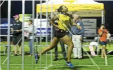  ?? Photo: Nev Madsen ?? WINNING RUN: Dianne Waight wins the women’s 300m final at last year’s Postle Gift meeting.