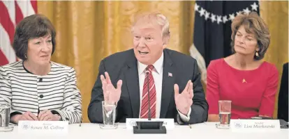  ?? MICHAEL REYNOLDS, EUROPEAN PRESSPHOTO AGENCY ?? President Trump meets with Sens. Susan Collins, R-Maine, and Lisa Murkowski, R-Alaska, to discuss health care on June 27.