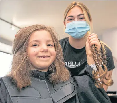  ??  ?? MAKEOVER: Alix Stewart in the salon with stylist Kirsty Reid holding up the hair she cut off. Picture by Kim Cessford. Right, Alix’s long locks before.