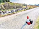 ?? ?? The hole problem: some of Andy Conroy’s dioramas, top. Above: a sizeable pothole on the Isle of Skye