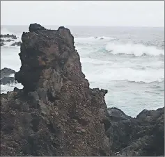  ??  ?? Surging breakers on the Portuguese island of Madeira battering the volcanic rock.