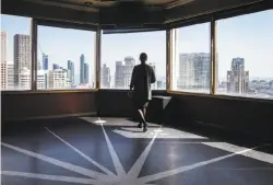  ??  ?? An employee walks across the dance floor of the Starlight Room atop the hotel, where it will celebrate its 90th birthday on Thursday.