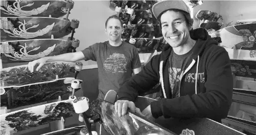  ?? Wayne Leidenfros­t/ postmedia news ?? Tom Edstrand, left, and Mike Perreten own Landyachtz, a Vancouver business that produces 2,000 longboards a week.