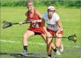  ?? KYLE FRANKO — TRENTONIAN PHOTO ?? Allentown’s Brianna Samuels, right, tries to keep the ball away from Jackson Liberty’s Lindsay McKenna, left, during a Central Group III semifinal game.