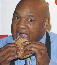  ?? GETTY IMAGES FILE ?? George Foreman, the two-time world heavyweigh­t champion who made a fortune by cashing in on his love of hamburgers, will celebrate his 69th birthday on Jan 10.