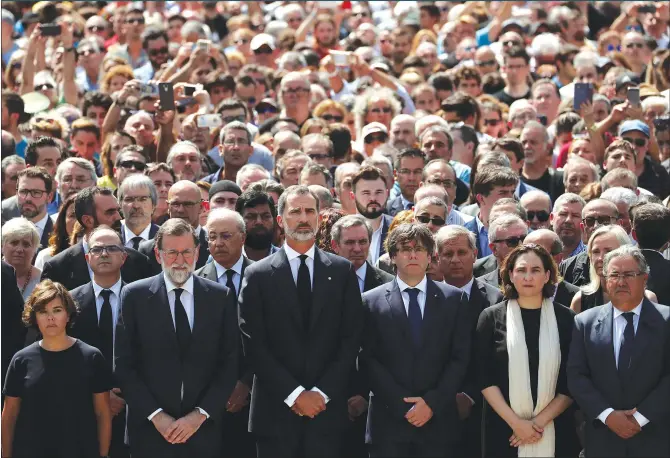  ?? Photo: CFP ?? From left: Spanish Deputy Prime Minister Soraya Saenz de Santamaria, Spanish Prime Minister Mariano Rajoy, Spanish King Felipe VI of Spain, President of the Generalita­t of Catalonia Carles Puigdemont, Barcelona’s Mayor Ada Colau and Spanish Interior...