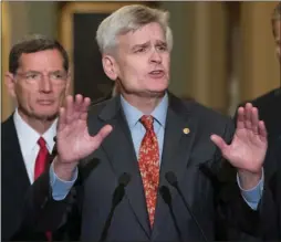  ?? The Associated Press ?? Sen. Bill Cassidy speaks to reporters about the latest proposal to uproot former President Barack Obama’s health care law. His efforts have been panned by TV talkshow host Jimmy Kimmel.