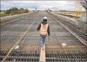  ?? ROBERT GAUTHIER Los Angeles Times ?? WORK CONTINUES on the San Joaquin River Viaduct that will carry high-speed rail riders.