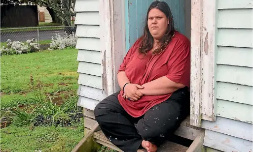  ?? MAHVASH ALI/ STUFF ?? Jessica Bankart sitting on the steps of her Housing New Zealand home she was allocated on October 27.