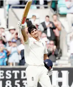  ?? — AFP photo ?? Alastair Cook celebrates his century during play on the fourth day of the fifth Test cricket match between England and India at The Oval in London.