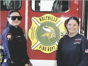  ?? MARCIE LANDEROS PHOTO ?? FROM LEFT: Holtville Fire Department reserve Firefighte­r Raylene Tapiceria and volunteer Maggie Velasco smile on the job at the Holtville Fire Department, Nov. 10, in Holtville.