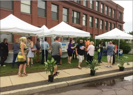  ?? EVAN BRANDT — MEDIANEWS GROUP ?? The Keim Street Gateway open house was held along the street in front of the iconic former office building for the former Bethlehem Steel plant.