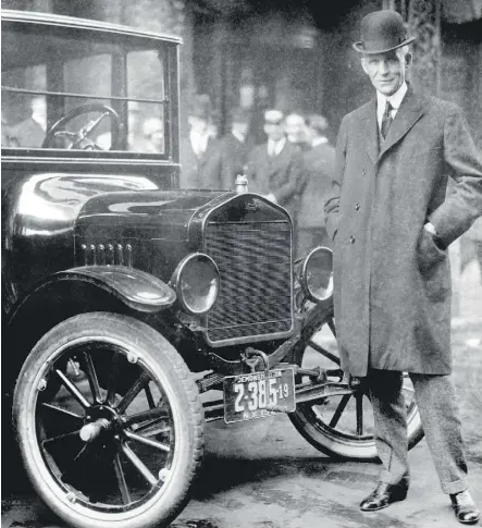  ?? FROM THE COLLECTION­S OF THE HENRY FORD AND FORD MOTOR COMPANY ?? Henry Ford with a 1921 Model T.