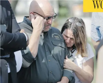  ?? ERIC GAY/THE ASSOCIATED PRESS ?? Pastor Frank Pomeroy and his wife, Sherri, join a news conference near the First Baptist Church in Sutherland Springs, Texas, on Monday. The couple’s 14-year-old daughter, Annabelle, was killed in a mass shooting Sunday.