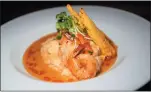  ?? STAFF FILE PHOTO ?? Shrimp and grits at Playt Southern Sideways Bar and Restaurant in Hayward.