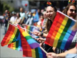  ?? ARIC CRABB — BAY AREA NEWS GROUP ?? Spectators line Market Street during the 52nd annual San Francisco Lesbian Gay Bisexual Transgende­r Pride Parade on Sunday in San Francisco.