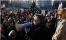  ?? Photograph: Andrej Cukic/EPA ?? Srdjan Djokovic addresses a rally in support of his son, the Serbian tennis player Novak Djokovic, in Belgrade on Friday.