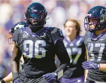  ?? BRANDON WADE/ AP ?? Defensive lineman Lwal Uguak (96) transferre­d from a 1-11 UConn team to TCU, where he is playing for the national championsh­ip on Monday night.