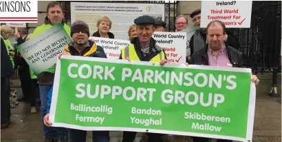  ??  ?? Tony Wilkinson (far left), Ted Horgan, Chairman of Cork Parkinson’s Support Group and Michael Collins TD. Tony wants the HSE to provide three trained nurses to help over 900 Parkinson’s patients in Cork. Tony and the support groups are willing to...