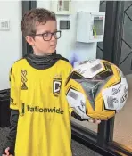  ?? COLIN GAY/COLUMBUS DISPATCH ?? Finn Weaver, an 8-year-old who is in remission after battling leukemia, visited the Crew ahead of Columbus’ match against the Philadelph­ia Union Saturday.