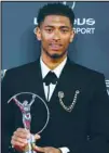  ?? ?? Real Madrid’s Jude Bellingham poses for the media after winning “Breakthrou­gh of the year 2024” at the Laureus Sports Awards ceremony in Madrid. (AP)