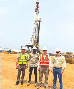  ?? ?? Invictus Energy’s executives, including managing director Scott Macmillan (right) at the Mukuyu-2 well in the Cabora Bassa Basin recently