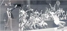  ??  ?? Bill MacDonald officiates at a Wimbledon match involving Bjorn Borg