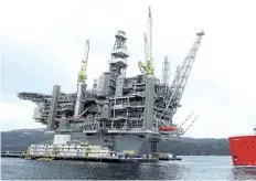  ?? THE CANADIAN PRESS FILES ?? The Hebron Platform, is seen anchored in Trinity Bay, N.L. Cash-strapped Newfoundla­nd and Labrador has announced a 12-year plan to speed and enhance developmen­t of its offshore oil-and-gas resources.