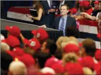  ?? JOHN LOCHER — THE ASSOCIATED PRESS ?? Nevada state Attorney General Adam Laxalt waits to take the stage before a campaign rally with President Donald Trump in Las Vegas. In the Nevada Governor’s race, Laxalt has frequently included anti-California messages in campaign appearance­s and statements.