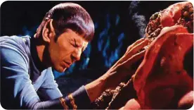  ??  ?? spock in mental communion with an alien that is essentiall­y a living rock ... just another day at the office for the enterprise crew.