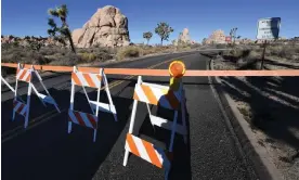  ?? Mark Ralston/AFP/Getty Images ?? A barrier blocks a campground at Joshua Tree national park on 3 January 2019. Photograph: