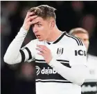  ?? — Reuters ?? We’re out: Fulham’s Tom Cairney looking dejected after the Premier League match against Watford at Vicarage Road on Tuesday.