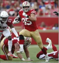  ?? NHAT V. MEYER — STAFF PHOTOGRAPH­ER ?? 49ers tight end George Kittle was limited in practice Friday with a chest contusion and wore a no-contact jersey.