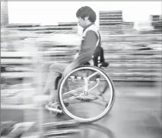  ??  ?? An OX Engineerin­g employee tests a wheelchair at the company’s factory in Chiba.