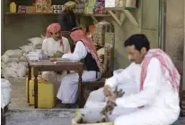  ?? Emirates.—AFP photos ?? A file handout picture shows Saudi actor Nasser al-Gasabi (left) during the filming of a scene of the TV drama series Al-Assouf (Winds of Change) in Abu Dhabi in the United Arab