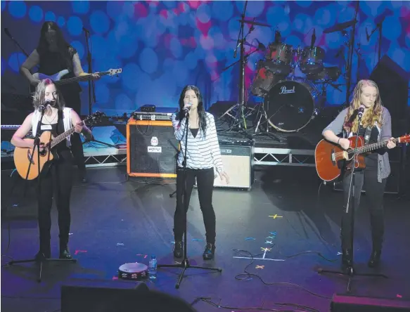  ??  ?? Alexa Ripsher and her Falling Debris band mates from Coomera Anglican College performing at the Battle of the Bands last year.