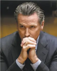  ?? Russell Yip / The Chronicle ?? Gavin Newsom has exchanged rhetorical fire with President Trump, but some strategist­s believe the governor-elect should change his focus as he moves from campaignin­g to leading.