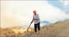  ?? HT FILE ?? A green tribunal bench, headed by NGT chairperso­n justice Adarsh Kumar Goel, said there is a need to find out a longlastin­g solution to the problems of stubble burning.