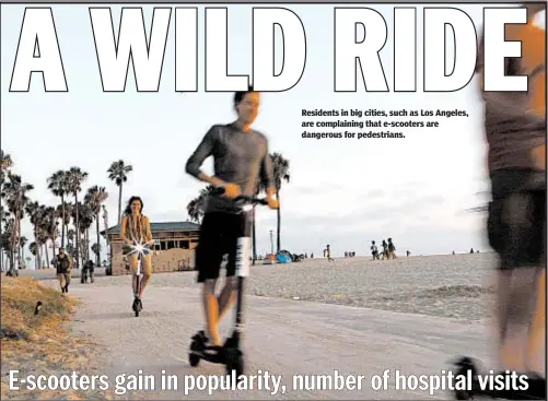  ?? GETTY ?? Residents in big cities, such as Los Angeles, are complainin­g that e-scooters are dangerous for pedestrian­s.