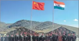  ?? PTI ?? The border guarding troops of Indian Army and Chinese Peoples' Liberation Army during a Military Border Personnel Meeting, in Bumla pass, recently.