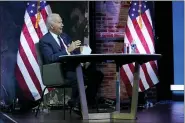  ?? ANDREW HARNIK — THE ASSOCIATED PRESS ?? President-elect Joe Biden attends a national security briefing at The Queen theater, Tuesday, in Wilmington, Del.