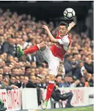  ??  ?? In the spotlight: Mesut Özil needs to be at his best against Manchester United