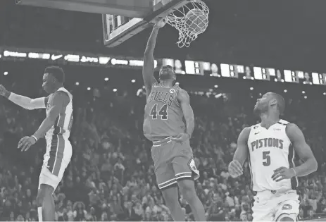  ?? CHRISTOPHE ENA/AP ?? The Bulls’ Patrick Williams dunks during the Pistons’ 126-108 loss Thursday at the Accor Arena in Paris.